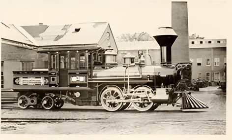 After AI enhancement (2x upscale): tiny 1875 builder's photo of a steam locomotive
