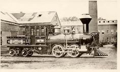 Before: tiny 1875 builder's photo of a steam locomotive